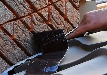 Lead flashing and flaunching repairs on chimney